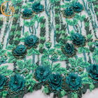 敏感な水溶性の花のレースの生地の刺繍はウェディング ドレスのための材料をひもで締める