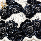 刺繍された黒いきらめきのレースの生地のフランス語は花嫁の服のために玉が付いた